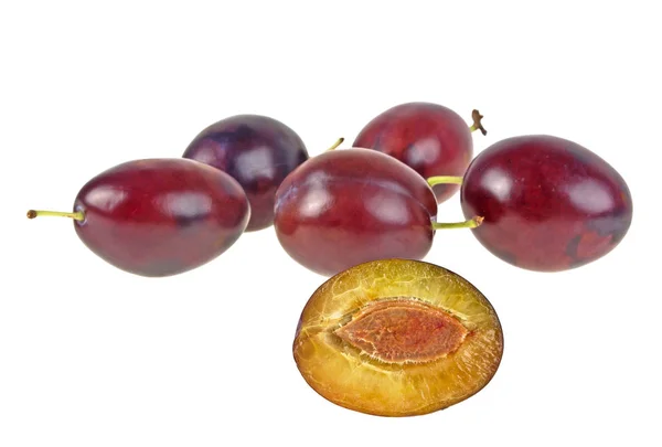 Group of plums isolated on a white background — Stock Photo, Image