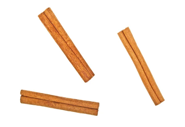 Cinnamon sticks on white background, top view — Stock Photo, Image