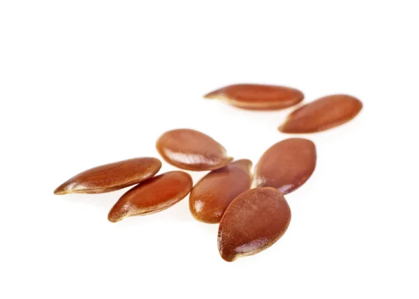 Close up de sementes de linho isoladas em fundo branco — Fotografia de Stock