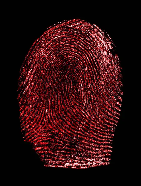 Червоний відбиток пальця на чорному тлі — стокове фото