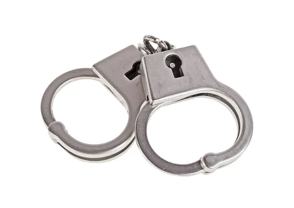 Серебряные наручники на белом фоне — стоковое фото