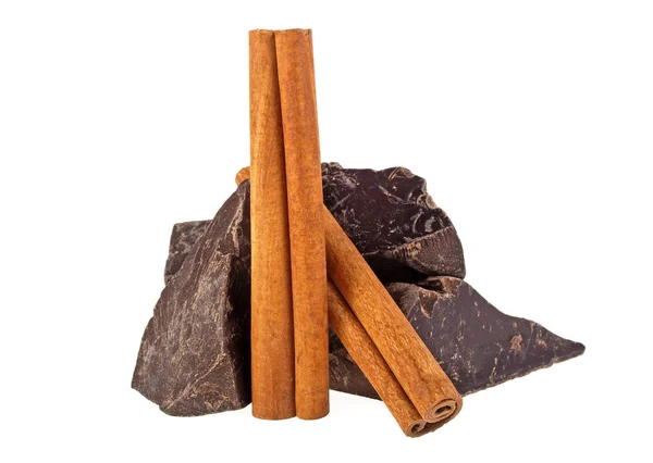 Chocolate and cinnamon sticks on a white background — Stock Photo, Image