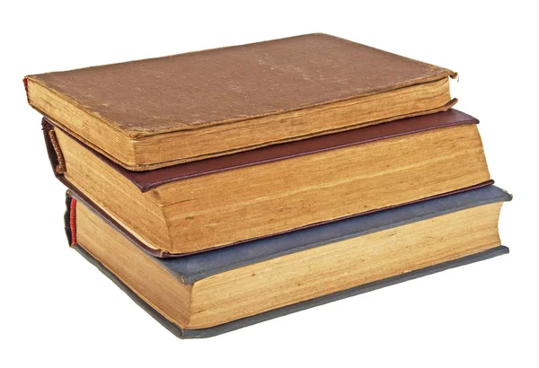 Стек старих книг на білому тлі — стокове фото