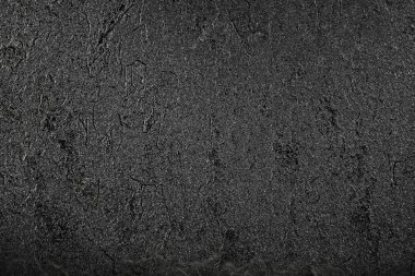 Arka plan olarak siyah taş dokusuna. Tasarım için boş.