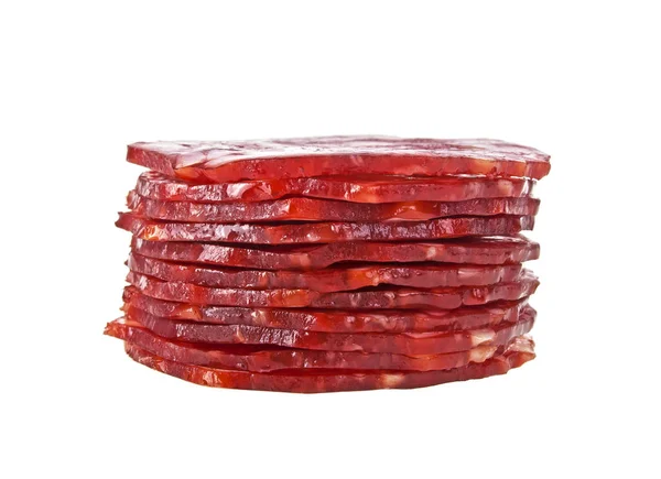 Fatias de salsichas de salame isoladas em um fundo branco — Fotografia de Stock