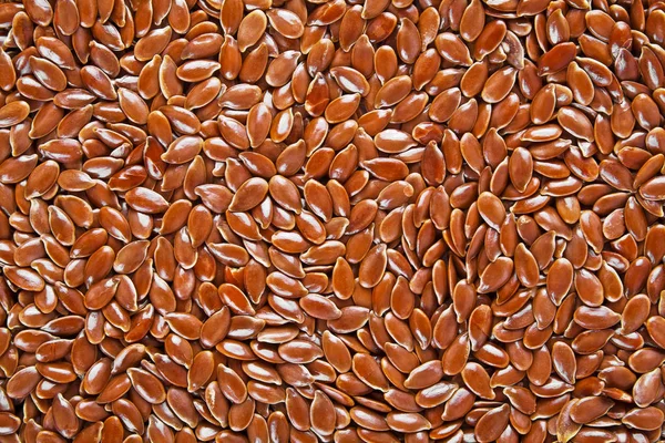 Flax seeds as background — Stock Photo, Image
