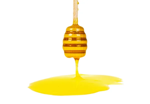 Μέλι που στάζει απομονωμένο σε λευκό φόντο — Φωτογραφία Αρχείου