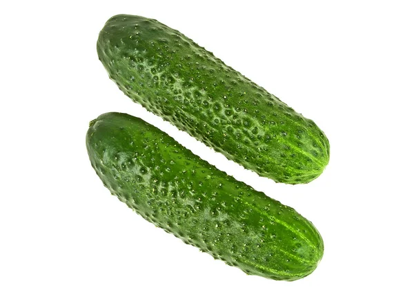 Komkommers op een witte achtergrond, bovenaanzicht — Stockfoto