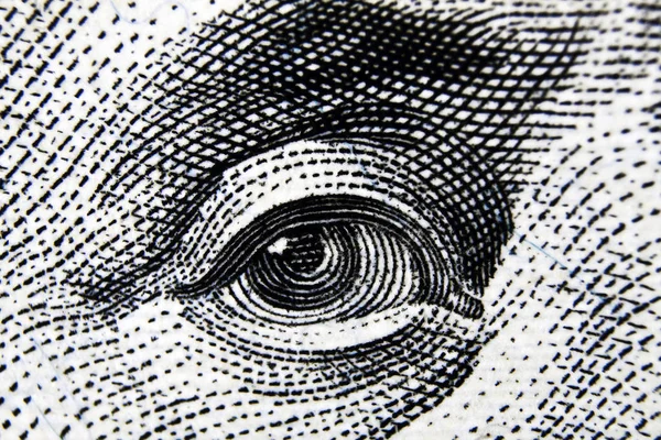 Göz. 100 $ banknot parçası.