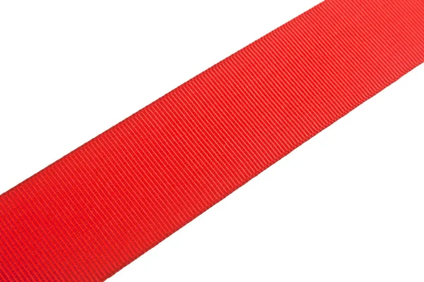 Червона атласна стрічка ізольована на білому тлі — стокове фото