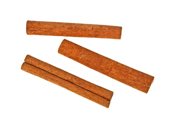 Vista superior de varillas de canela aisladas en blanco — Foto de Stock