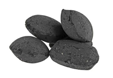 Beyaz arka plan üzerinde izole Coco kömür briquetts