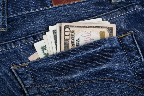 Dollars billets en jeans bleu poche arrière — Photo