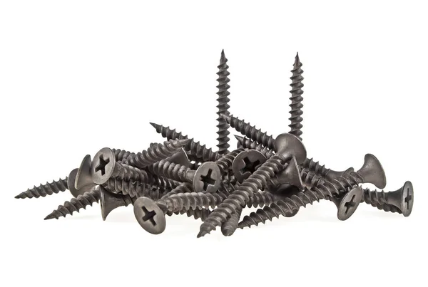 Close-up of black metal screws isolated on a white background — Stock Photo, Image