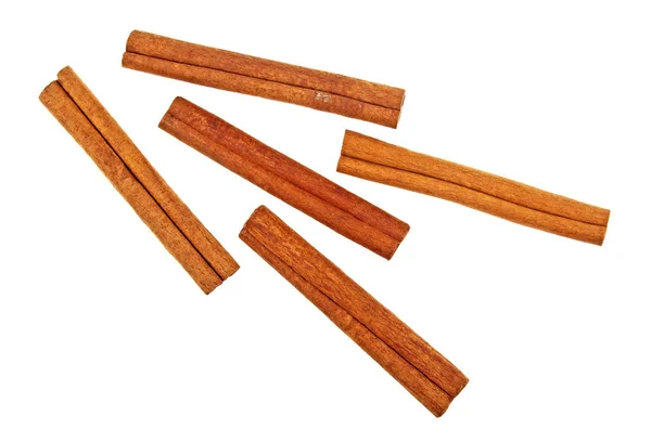 Cinnamon sticks on white background. Top view. — Stock Photo, Image