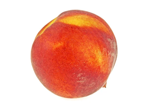 Rijpe perzik fruit geïsoleerd op een witte achtergrond — Stockfoto