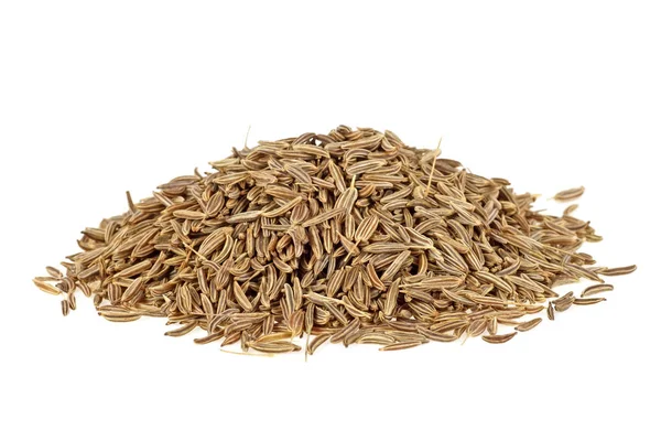 Pile de graines de cumin isolées sur un fond blanc — Photo