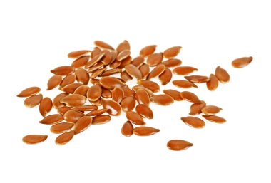 Beyaz arka plan üzerinde linseeds yığını