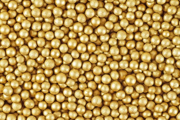 Κοντινό πλάνο μικρές χρυσές σφαίρες — Φωτογραφία Αρχείου