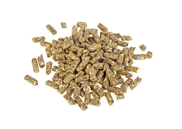 Pelleterat foderblandningar på en vit bakgrund, wheatfeed pellets. — Stockfoto