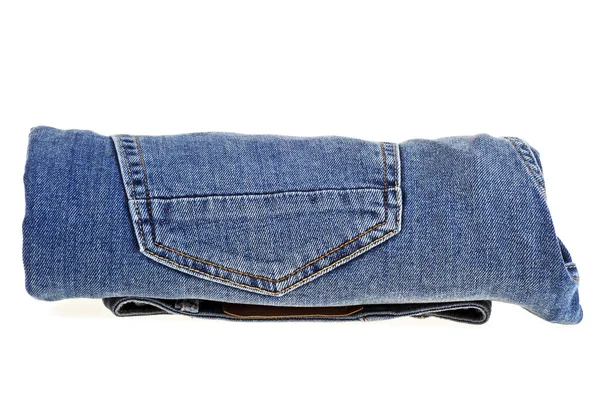 Jeans torcida em rolo isolado sobre fundo branco — Fotografia de Stock
