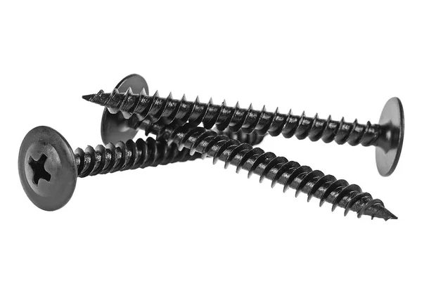 흰색 배경에 분리 된 검은 금속 나사의 근접 사진 — 스톡 사진
