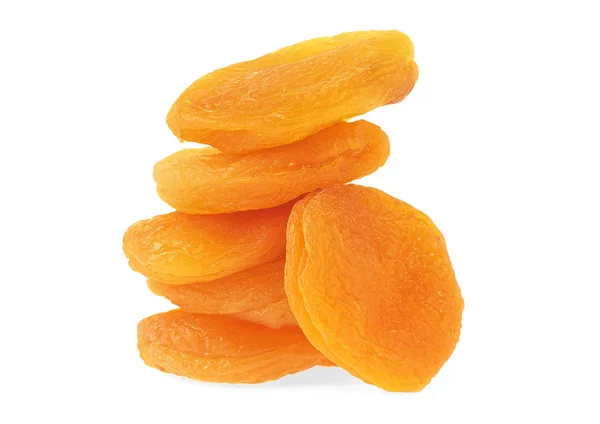 Stapel getrockneter Aprikosen auf weißem Hintergrund — Stockfoto