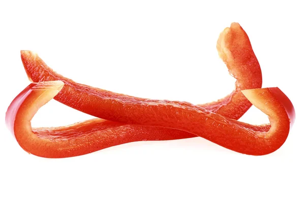 Rode zoete paprika segmenten geïsoleerd op witte achtergrond — Stockfoto