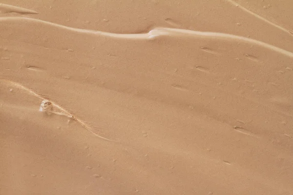 Texture of liquid foundation, as background