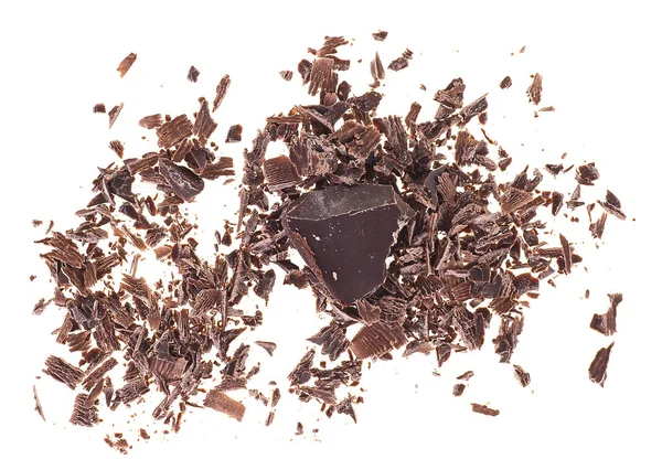 Pilha de raspas de chocolate moído no fundo branco. Vista superior . — Fotografia de Stock