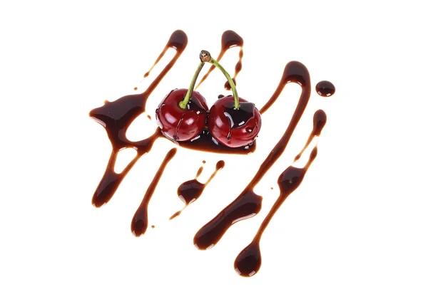 Cherries in chocolate on a white background — Stock Photo, Image