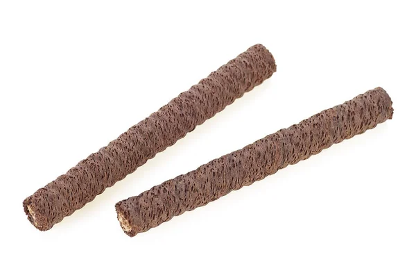 Dois rolos de wafer com chocolate em um fundo branco — Fotografia de Stock