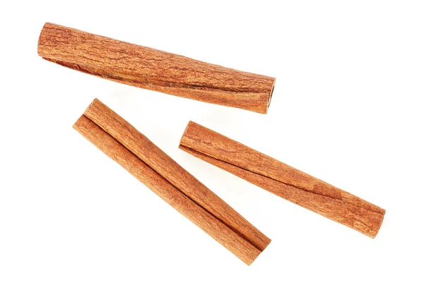 Fragrant cinnamon sticks isolated on white background, top view — Stock Photo, Image