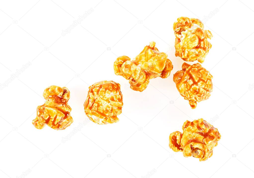 Popcorn with caramel isolated on a white background, top view