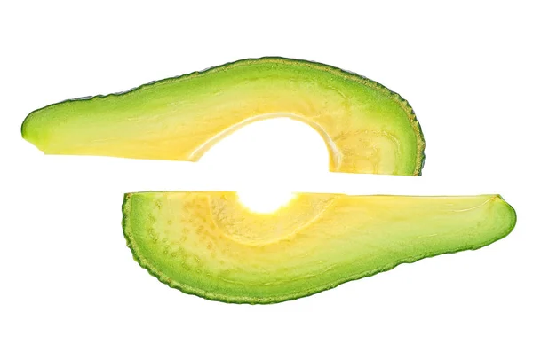 Zwei Avocadoscheiben auf weißem Hintergrund — Stockfoto