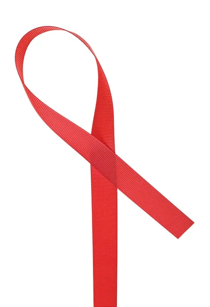 Red support ribbon on a white background. World AIDS Day concept — Stock Photo, Image