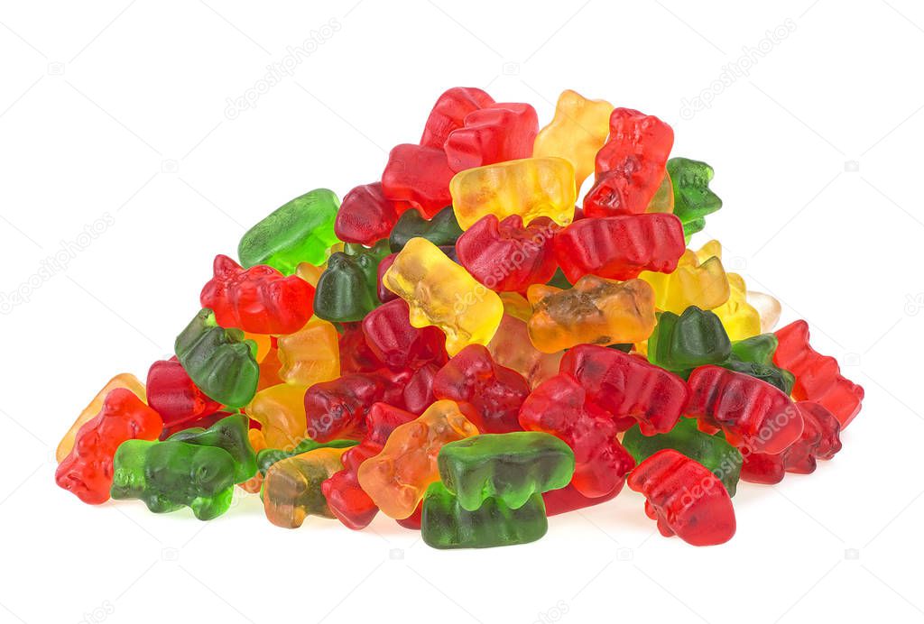Pile of multicolored jelly bears candy on a white background