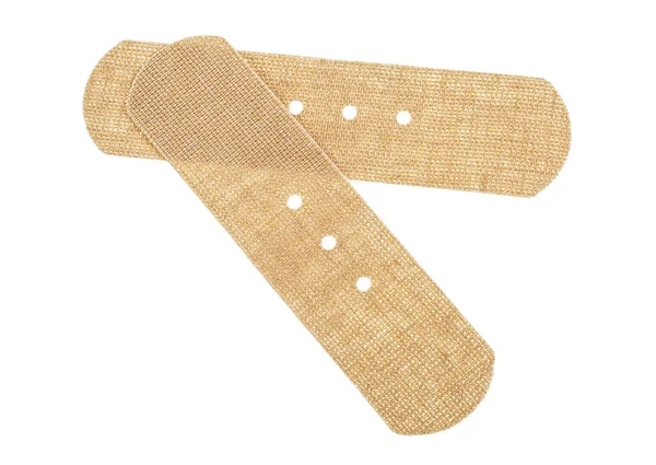 Top view of two beige adhesive bandages isolated on a white back — Stock Photo, Image