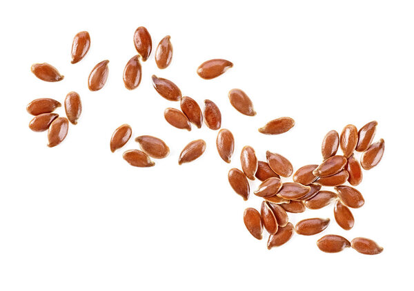 Brown flax seeds isolated on a white background. Common Flax. Linum usitatissimum.