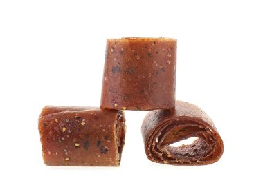 Fruit roll up bar, pastille isolated on a white background. Food for vegans. Healthy snack food.