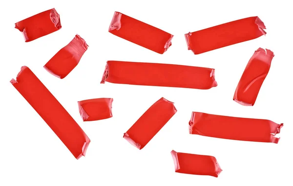 白い背景に隔離された赤いテープのスライスのセット 異なる形状の赤絶縁テープ — ストック写真
