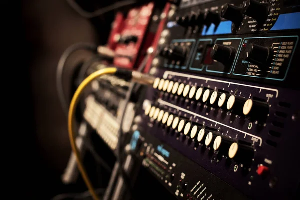 recording studio gears in rack