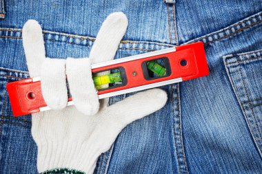 eldiven, onarım için kot arka plan düzeyde su / yenileme araçları DIY kavramı geri yükleme