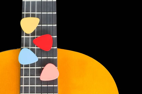 Красочные подборки на гитарной доске — стоковое фото