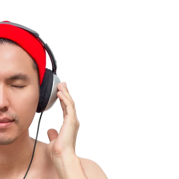 Asiatico bello uomo ascolto musica con cuffie — Foto Stock