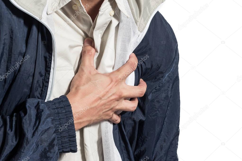 hands grabbing on chest & copy space on right for heart attack or sentimental concept