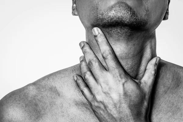 Sore throat asian man. touching neck — Stock Photo, Image