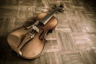 ahşap zemin üzerinde Vintage Klasik keman müzik arka planı için