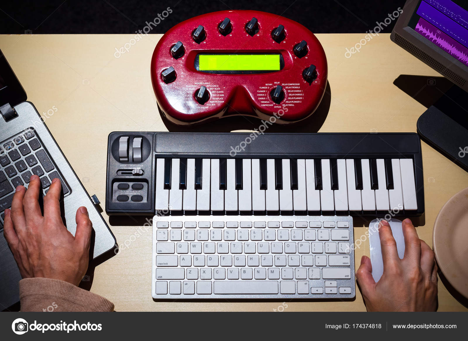 Male Composer Hands Using Computer Midi Keyboard Studio