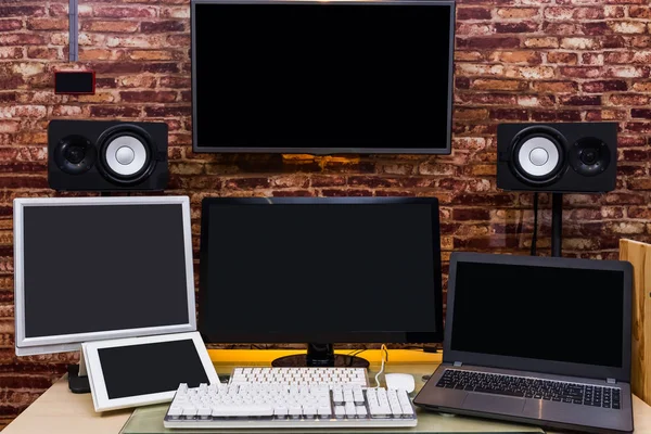 Many Blank Screen Electronic Devices Working Space Technology Background Royalty Free Stock Photos